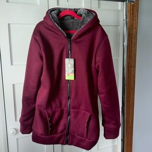 Woman’s maroon XL coat